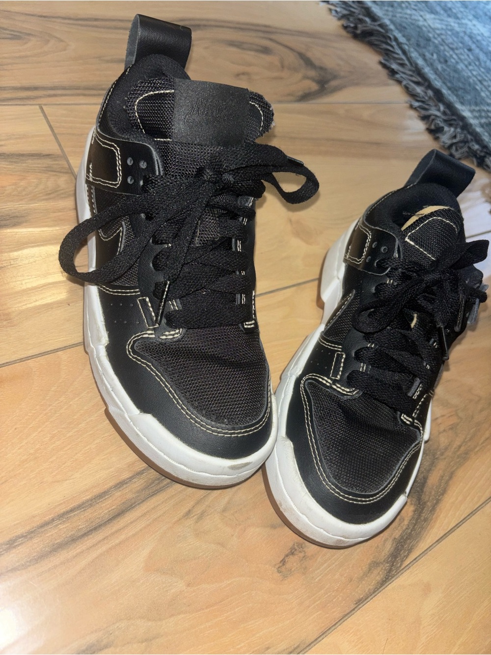 Nike Black and White High-Top Sneakers with Contrast Stitching